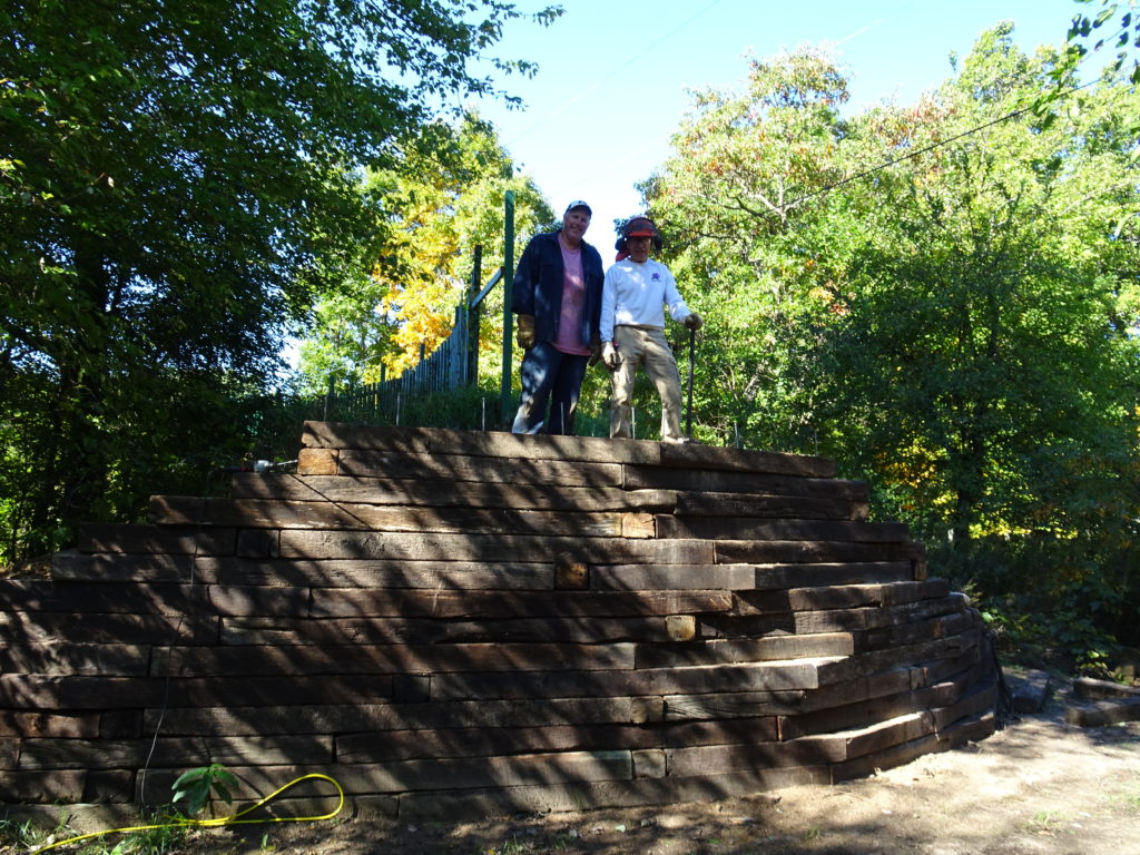 Bill and helper Bryan at the finish of the berm retaining wall...